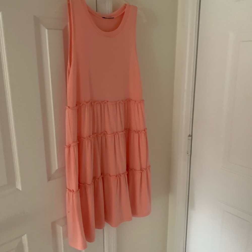 Cute tank dress with some ruffles.
Purchased on Amazon.